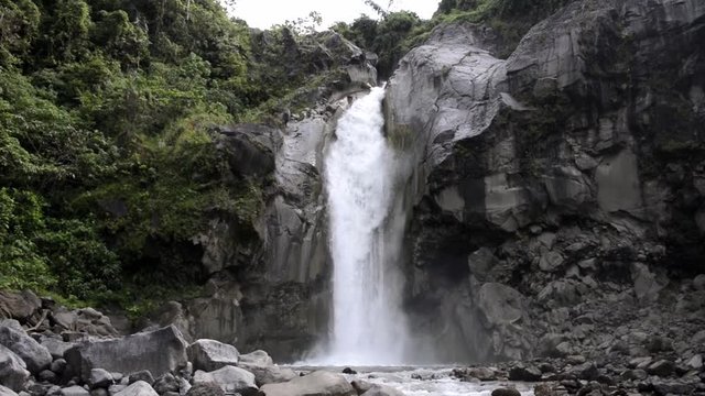 Mangku Sakti Waterfall crashing on rocks below in Lombok, Indonesia.