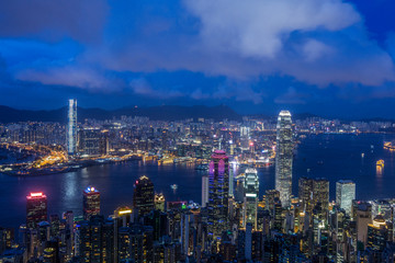 Victoria harbor view from Victoria peak viewpoint with twilight sky