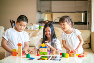 group of Asian children playing toy together at home, Asian kids concept