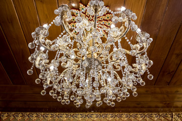 Crystal chandelier lamp on the ceiling.