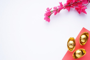 Chinese New Year flat lay white background with assorted festival decorations. Chinese characters...