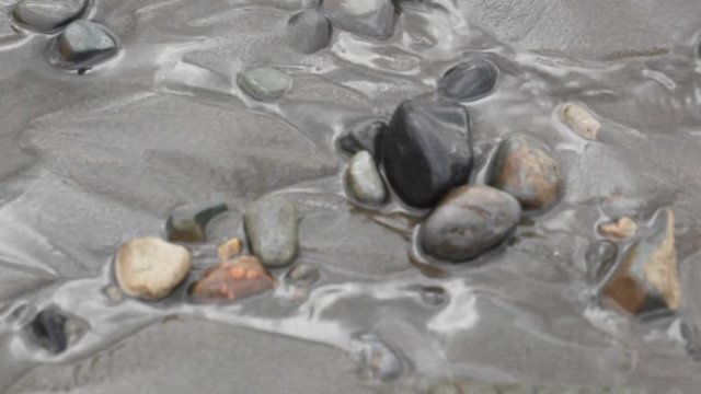 Trickle Through Beach Rocks