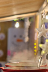 Christmas city fair. Close up view of the pot filled with the mulled wine