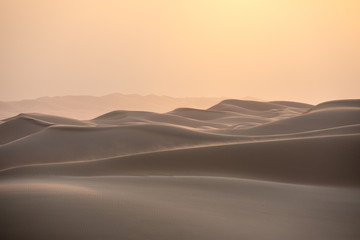 Abstract view of sand dunes in the desert at sunrise. Liwa desert, Empty Quarter, United Arab...