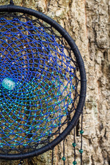 Handmade dream catcher with feathers threads and beads rope hanging