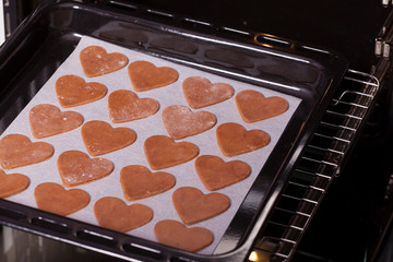 dough and heart-shaped cookies as a symbol of Valentine's Day