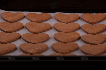 dough and heart-shaped cookies as a symbol of Valentine's Day