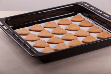 dough and heart-shaped cookies as a symbol of Valentine's Day