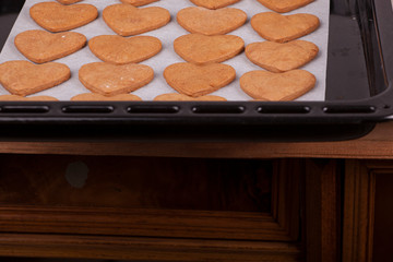 dough and heart-shaped cookies as a symbol of Valentine's Day
