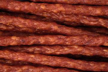 long and thin sausages kabanos closeup, macro shot