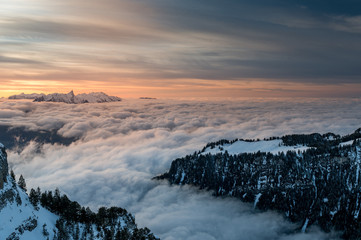 sea of fog in front of Mount Stockhorn at a winter sunset