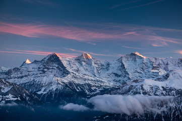 Eiger Mönch and Jungfrau during the blue hour in winter - obrazy, fototapety, plakaty