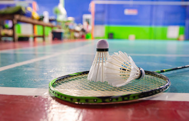 Shuttlecock on badminton court, soft focus image