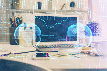 Forex market chart hologram and personal computer background. Multi exposure. Concept of investment.