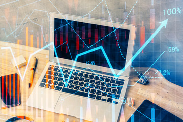 Multi exposure of chart and financial info and work space with computer background. Concept of international online trading.