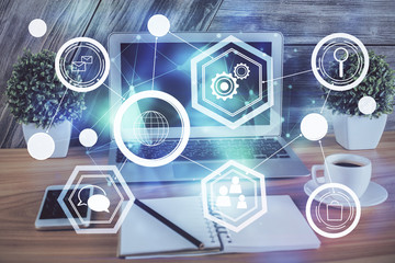 Computer on desktop with social network theme icon. Multi exposure. Concept of international...