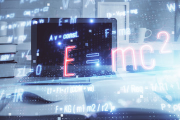 Desktop computer background and formula hologram writing. Double exposure. Education concept.