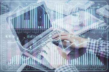 Double exposure of forex graph with man working on computer on background. Concept of market analysis.