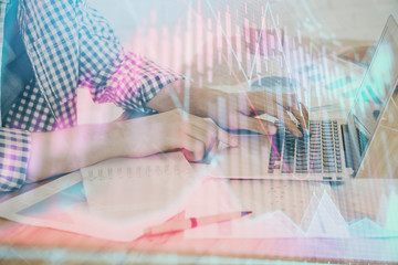 Multi exposure of stock market chart with man working on computer on background. Concept of financial analysis.