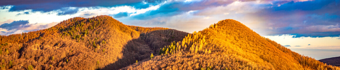 Wooded hills in the autumn in the Carpathians