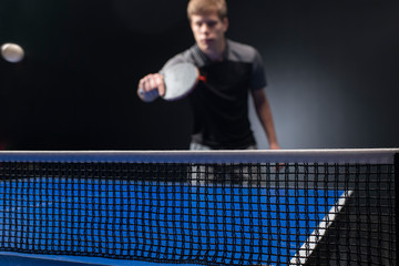 Young man tennis player. Fitness, health.