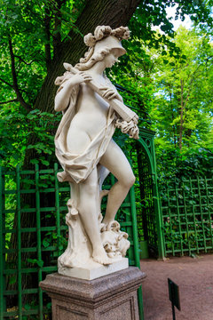 Sculpture of Roman goddess of war Bellona in old city park "Summer garden" in St. Petersburg, Russia