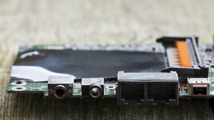 Audio connectors on laptop motherboard.