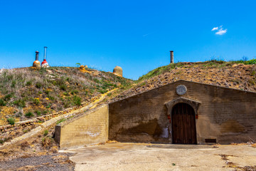 Neglected traditional bodega in Reliegos, Province of Leon, Castile and Leon, Spain on the Way of St. James, Camino de Santiago