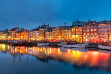 Fotobehang Beautiful Copenhagen city skyline at night  in Denmark  © surangaw