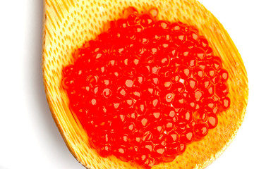 red caviar on white background