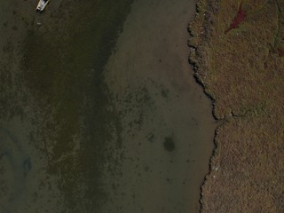 Aerial overhead photo from a drone over a swamp on the delta of Axios river in Thessaloniki/Greece ...