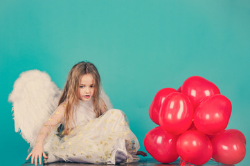 Lovely and cute little Girl angel. Little angel Girl in white dress with angel wings on isolated...