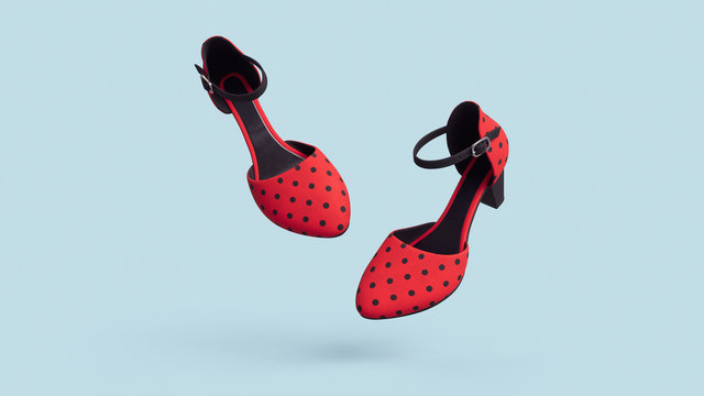 Pair of female summer red shoes with black polka dots floating on blue background. Concept art women's shoes. Vintage retro sandals with black strap and insole. Fashion style footwear. 3d illustration
