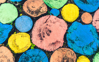 Abstract pattern of round shaped multi-colored tree stumps