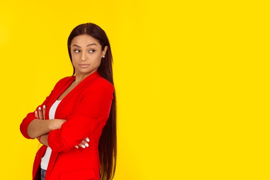 woman arms crossed bad attitude looking back envious