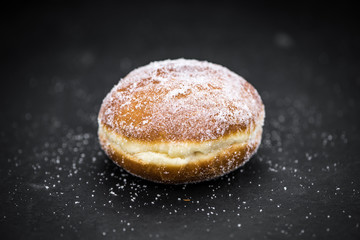 Portion of fresh made Almond Flour on a slate slab (selective focus)