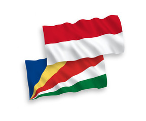 Flags of Indonesia and Seychelles on a white background