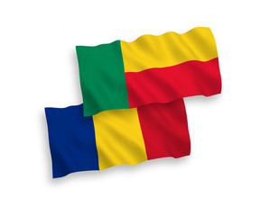 Flags of Romania and Benin on a white background
