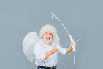 Handsome male angel Cupid. Bearded man with angel wings. Valentines day card. Valentines Day. Angel...