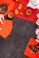 Design concept of Chinese lunar January new year - Woman holding, giving red envelopes (ang pow,...