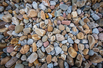 Stack of stones against blurred seascape on a beach swansea wales, space for text. Zen concept