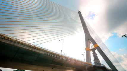 Thailand, Bangkok, view of the Rama VIII Bridge and the Chao Praya river at sunset