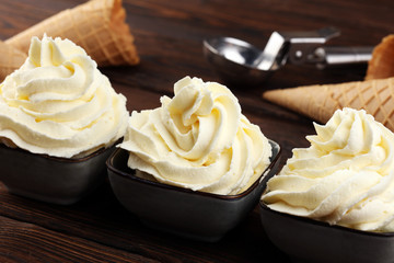 Vanilla soft served ice cream tasty sundae dairy ice cream on rustic background