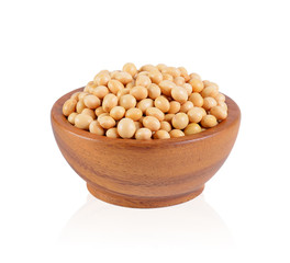 Soybean in wooden bowl on white