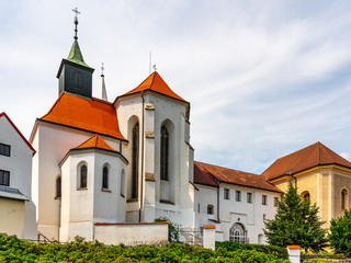 Fototapeta na wymiar Church of St. John the Baptist and Minorite monastery in Jindrichuv Hradec, Czech Republic