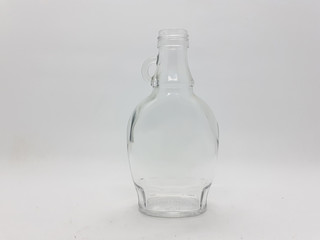 Empty Transparent Artistic Luxury Classic Bottle for Beverages Drinks in Kitchen Restaurant with White Isolated Background