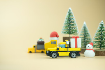 Car carries gift box. Concept of Christmas tree decoration sale.