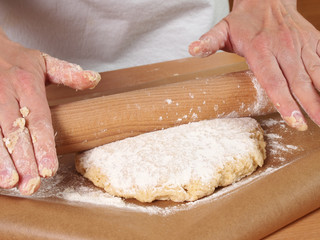 Rolling pastry to round. Making Chocolate Layer Cake with Cream Cheese Filling and Chocolate Topping. Series.