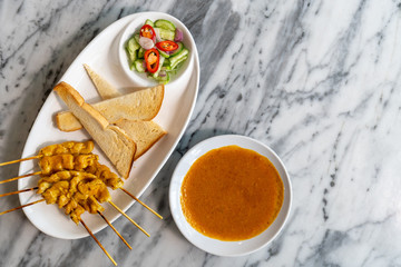 Pork Satay with baked bread