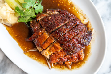 Roasted duck cut on the white dish